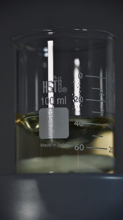 Folium's beard oil formula being mixed on a magnetic stirrer